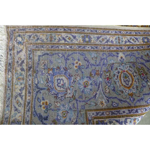 481 - A Kashan, hand knotted, woollen rug with caucasian ground, approximately 375cm x 275cm, some light w... 