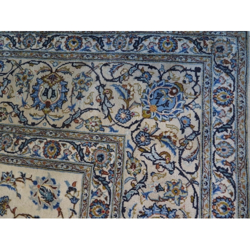 478 - A hand knotted woollen Fine Kashan rug - 420cm x 308cm