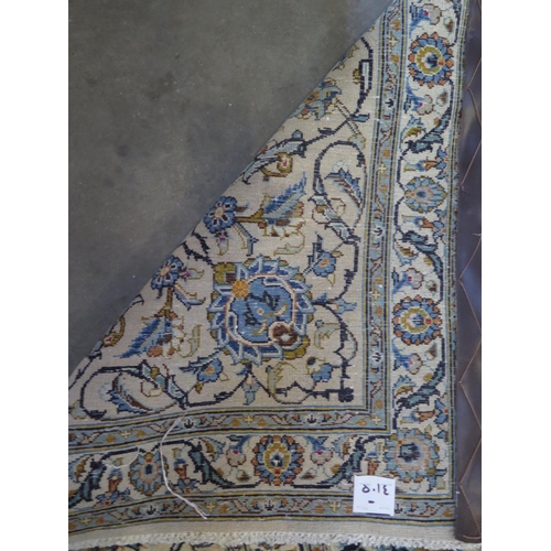 478 - A hand knotted woollen Fine Kashan rug - 420cm x 308cm