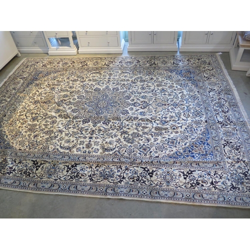 483 - A hand knotted woollen Fine Nain rug - 388cm x 291cm