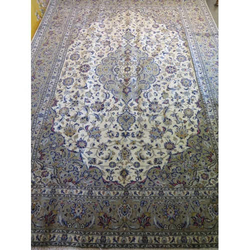 485 - A hand knotted, woollen Kashan rug, caucasian ground, approx. 285cm x 200cm, in good condition