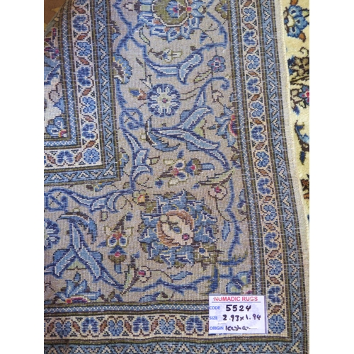 486 - A hand knotted woollen kashan rug, with caucasian ground, approx. 293cm x 194cm, in good condition