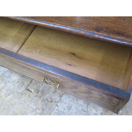 10 - An early 20th Century oak chest of drawers with three drawers, approx 108cm W x 81cm H x 49cm D - st... 