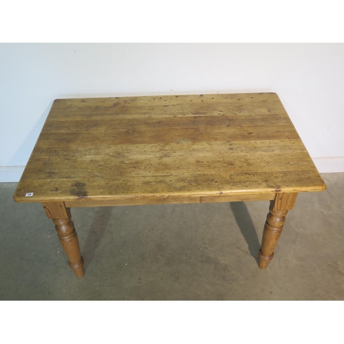 14 - A Victorian style pine kitchen table, 77cm H x 142cm x 90cm