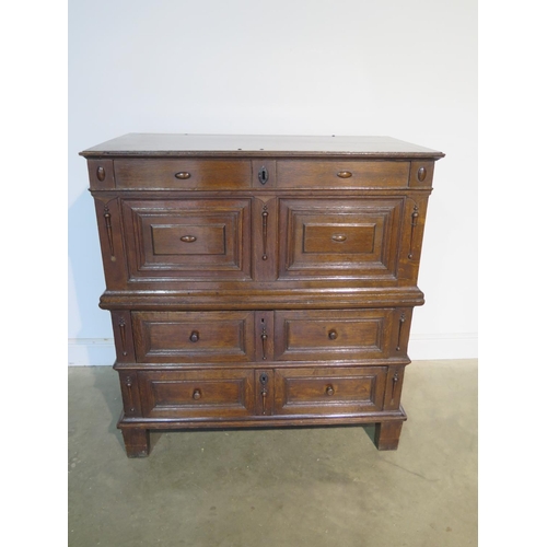 151 - An 18th Century oak two part chest with a lift up top above two long drawers, having a good colour a... 