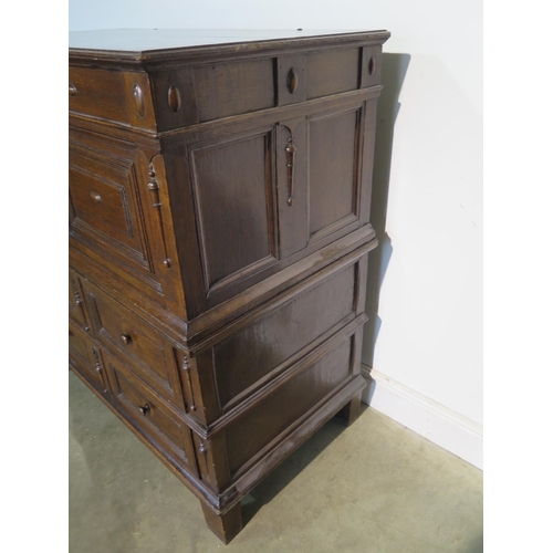 151 - An 18th Century oak two part chest with a lift up top above two long drawers, having a good colour a... 