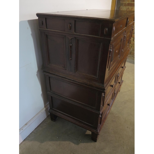 151 - An 18th Century oak two part chest with a lift up top above two long drawers, having a good colour a... 