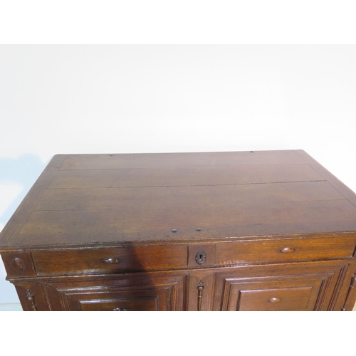 151 - An 18th Century oak two part chest with a lift up top above two long drawers, having a good colour a... 