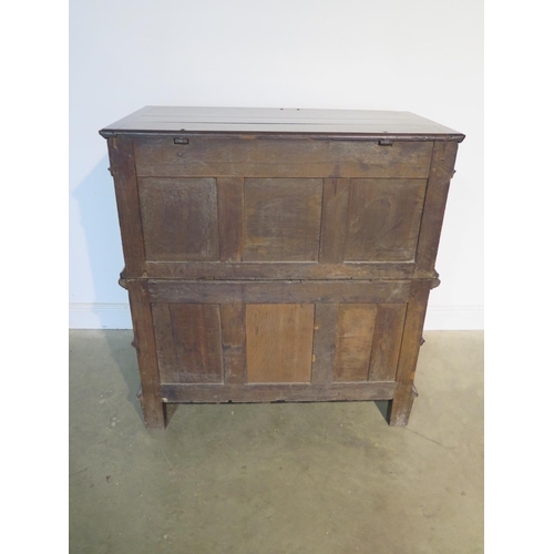 151 - An 18th Century oak two part chest with a lift up top above two long drawers, having a good colour a... 