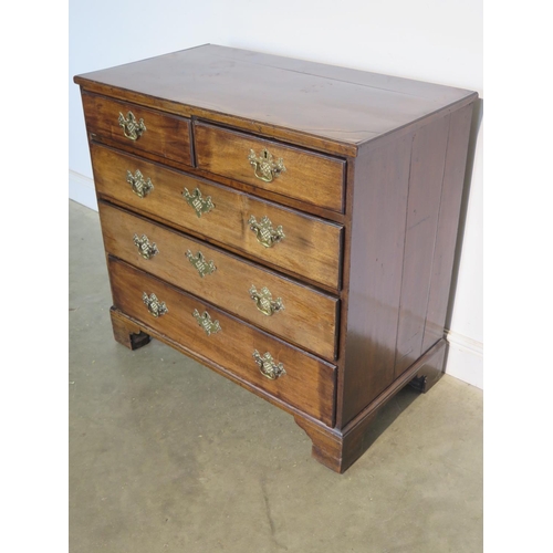 153 - A Georgian mahogany chest with two short over three long drawers - 89cm H x 94cm x 52cm