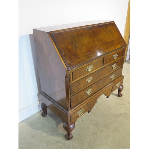 155 - A good quality early 20th Century Georgian style mahogany bureau with a fitted interior, above two s... 