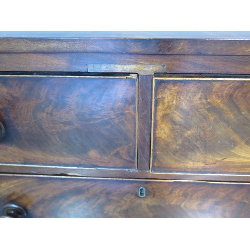 164 - A 19th Century flame mahogany chest with two short over two long drawers on bracket feet, 98cm W x 9... 