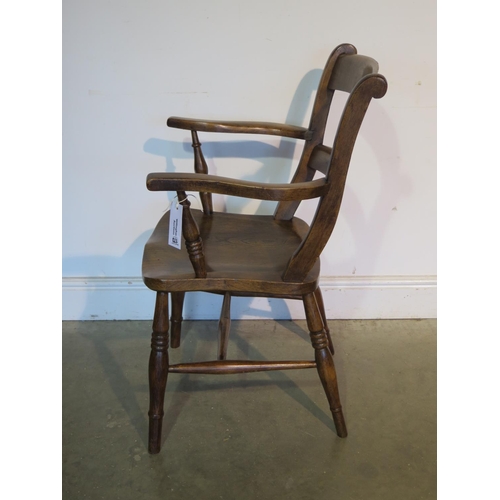 173 - A 19th Century elm arm chair, good colour and patina