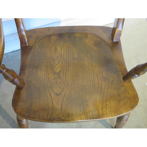 173 - A 19th Century elm arm chair, good colour and patina