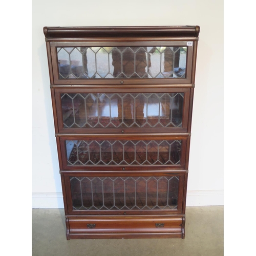 179 - A four section Globe Wernicke bookcase with drawer to base, Globe Wernicke stamp to back of one sect... 