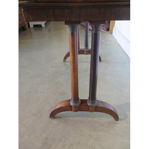 181 - A 19th Century rosewood card table, with twin pillar supports and arched feet, 92cm wide, 45cm deep,... 