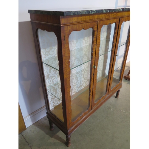 183 - A 19th Century style satinwood marble top display cabinet with two doors and two glass shelves, 122c... 