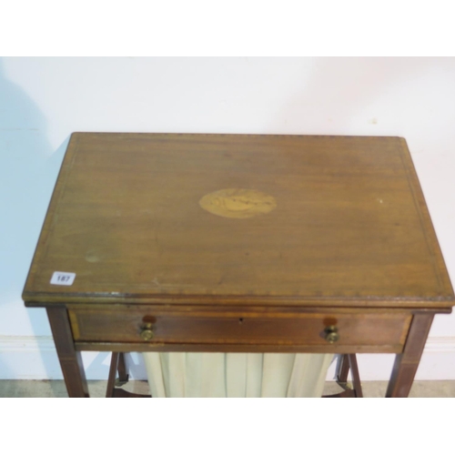 187 - An Edwardian mahogany fold over card table, work box with a basket and drawer - 73cm tall, 61cm wide