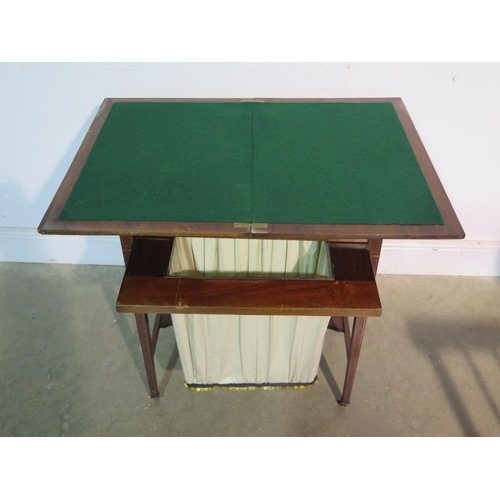 187 - An Edwardian mahogany fold over card table, work box with a basket and drawer - 73cm tall, 61cm wide