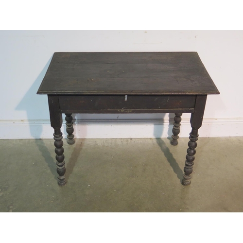 192 - A 17th/18th Century oak side table on turned supports with a single drawer, with good colour, in nee... 