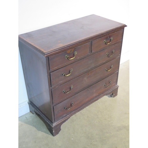 193 - A good quality Georgian mahogany chest with two short over three long drawers on shaped bracket feet... 