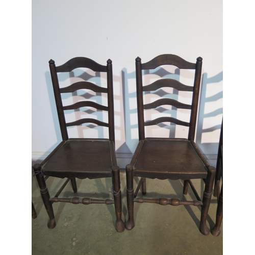 196 - Seven 19th Century ladder back chairs all with solid seats to include three matching, a pair and two... 