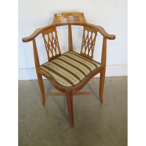 209 - An Edwardian inlaid mahogany corner chair