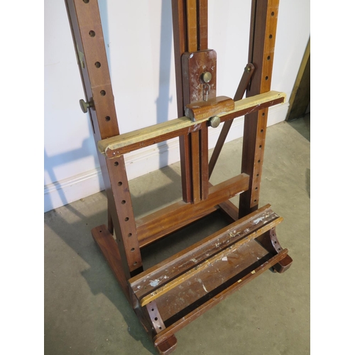 22 - A mahogany artist studio easel by Rembrandt