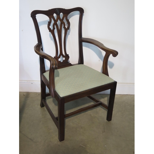 224 - A set of ten 19th Century mahogany dining chairs including two carvers with drop in seat pads with a... 