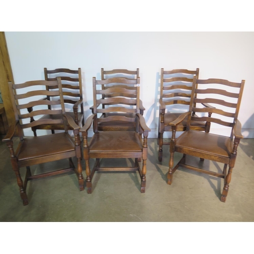 248 - A set of six oak ladder back armchairs with drop in seats - in good condition