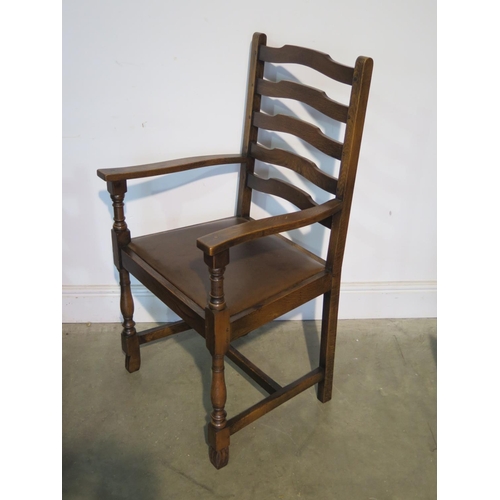 248 - A set of six oak ladder back armchairs with drop in seats - in good condition