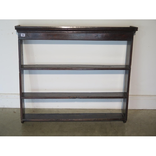 258 - A Georgian oak hanging shelf - H85cm x W92cm