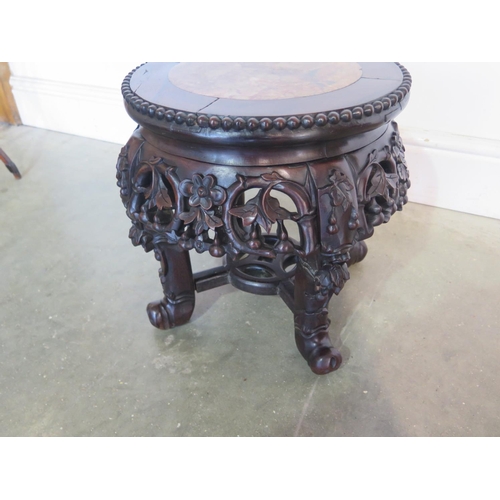 263 - An Oriental marble top carved mahogany jardiniere stand, with good colour, in good condition - H34cm... 