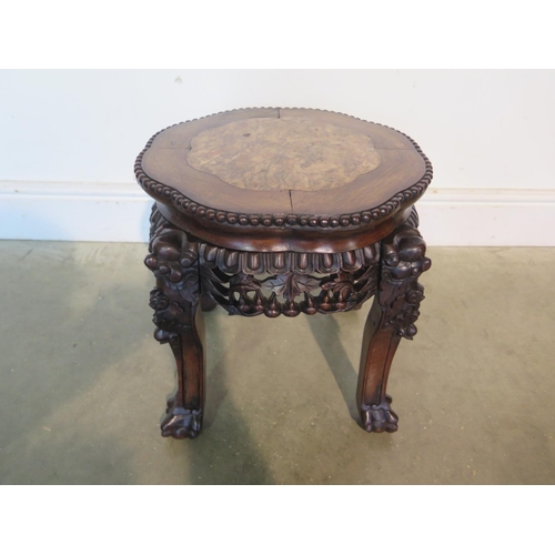 264 - An Oriental marble top carved mahogany jardiniere stand, with good colour in good condition, H39cm x... 