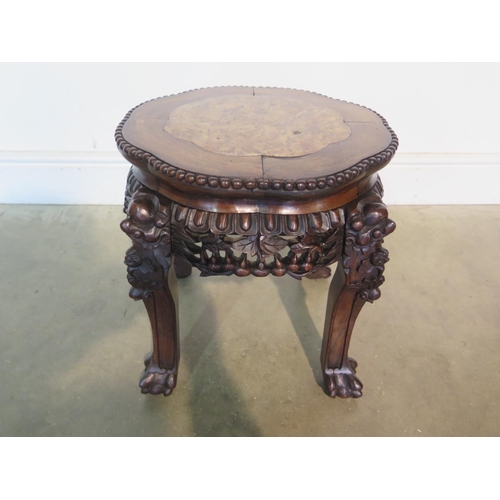 264 - An Oriental marble top carved mahogany jardiniere stand, with good colour in good condition, H39cm x... 