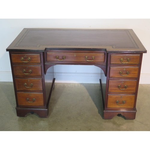 269 - A well restored Edwardian line inlaid mahogany kneehole desk, with an inverted leather inset top ove... 