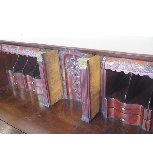 271 - A good quality well restored 19th Century Cuban mahogany bureau with a fitted interior, including se... 