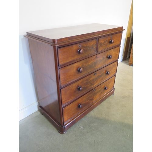 273 - A well restored Victorian mahogany chest with two short over three long drawers on flattened bun fee... 