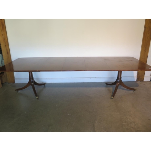 274 - A large mahogany dining table with three additional leaves, approx 305cm x 112cm fully extended - in... 