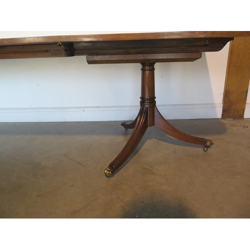 274 - A large mahogany dining table with three additional leaves, approx 305cm x 112cm fully extended - in... 