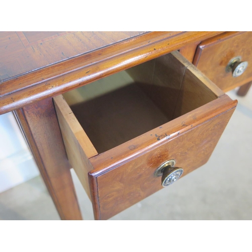 275 - A burr walnut five drawer hall/side table made by a local craftsman to a high standard, H77cm x 100c... 