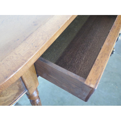 277 - A burr walnut D shaped hall/side table with two drawers on turned reeded legs, made by a local craft... 