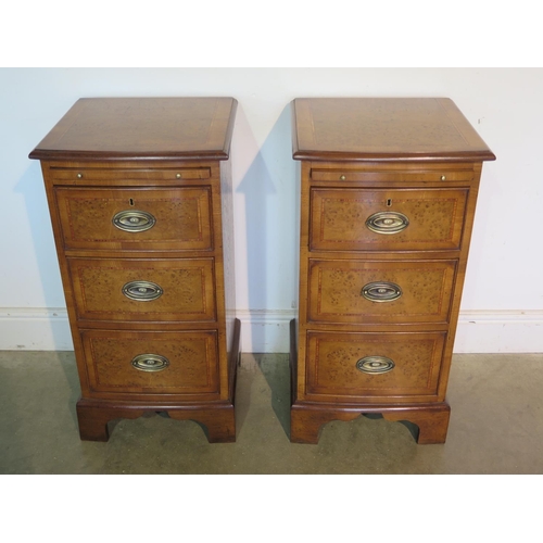 283 - A pair of burr oak bow fronted bedside chests with a slide above drawers on bracket feet, made by a ... 