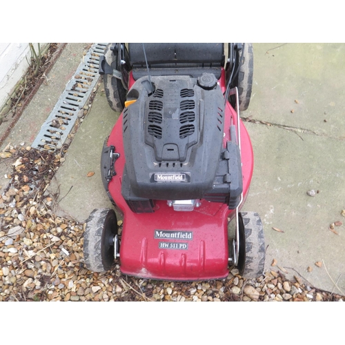 31 - A Mountfield petrol mower, HW511 RD in running order, starts easily, RRP £479