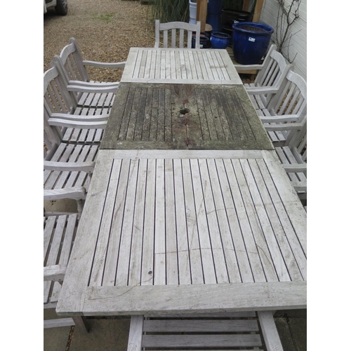 33 - A Barlow Tyrie Waveney good quality teak extending garden table and 10 armchairs, table extends to 3... 