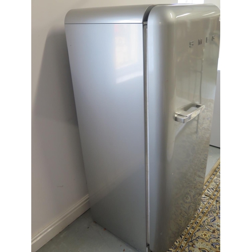 35 - A classic Smeg FAB 28x3 fridge, in grey with ice box, 145cm H, 60cm W x 66 deep, in working order, s... 