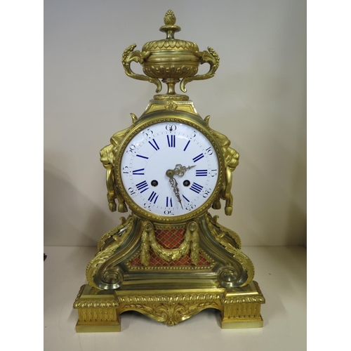 401 - A good quality 19th Century large gilt ormulu mantle clock with lions mask handles and acanthus scro... 