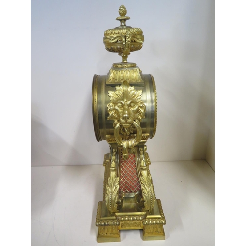 401 - A good quality 19th Century large gilt ormulu mantle clock with lions mask handles and acanthus scro... 