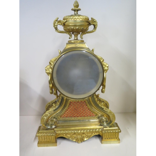 401 - A good quality 19th Century large gilt ormulu mantle clock with lions mask handles and acanthus scro... 