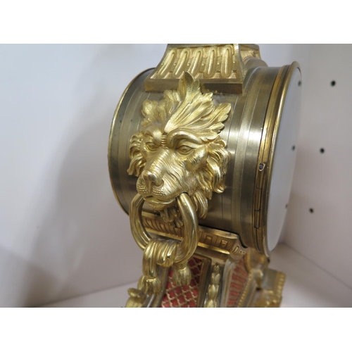 401 - A good quality 19th Century large gilt ormulu mantle clock with lions mask handles and acanthus scro... 